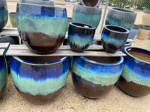 Ellis Home & Garden Malaysian Glazed Pottery in various sizes and colors. Available inside our retail stores only