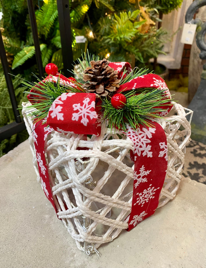 8" White Rattan Lighted Christmas Present with Red & White Snowflake Bow