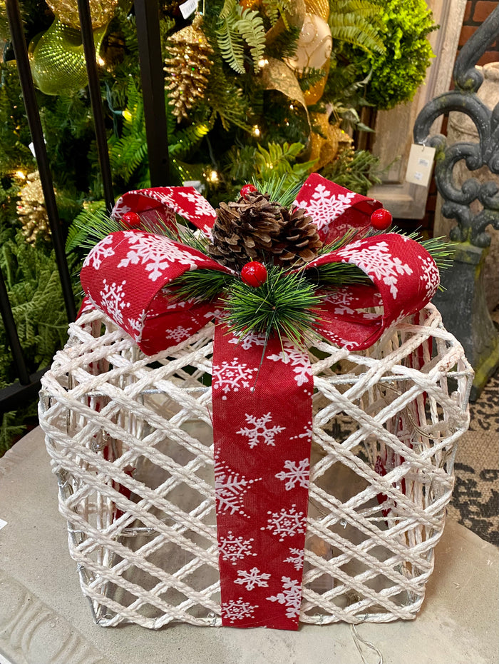 10" White Rattan Lighted Christmas Present with Red & White Snowflake Bow